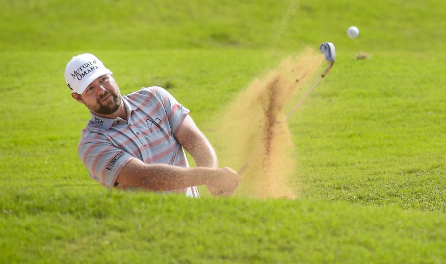 KAPALUA, MAUI, HI - JANUARY 07: Ryan Moore hits a bunker shot on the seventh hole during the third round of the SBS Tournament of Champions at Plantation Course at Kapalua on January 7, 2017 in Kapalua, Maui, Hawaii. (Photo by Stan Badz/PGA TOUR)