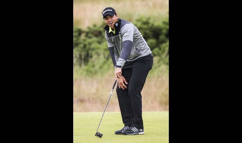 ST ANDREWS, SCOTLAND - JULY 16: Jason Day of Australia reacts to a putt by Louis Oosthuizen of South Africa on the 5th green during the first round of the 144th Open Championship at The Old Course on July 16, 2015 in St Andrews, Scotland.  (Photo by Streeter Lecka/Getty Images)