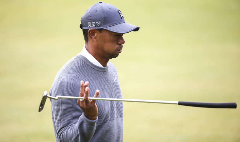 ST ANDREWS, SCOTLAND - JULY 16: Tiger Woods of the United States reacts as he walks off of the 18th green during the first round of the 144th Open Championship at The Old Course on July 16, 2015 in St Andrews, Scotland.  (Photo by Streeter Lecka/Getty Images)