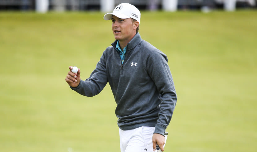 ST ANDREWS, SCOTLAND - JULY 16: Jordan Spieth of the United States salutes the crowd on the 18th green during the first round of the 144th Open Championship at The Old Course on July 16, 2015 in St Andrews, Scotland.  (Photo by Streeter Lecka/Getty Images)