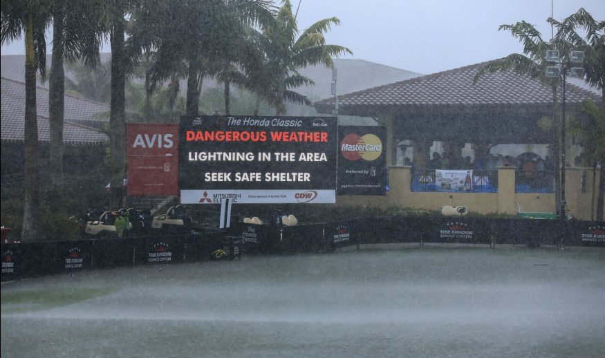 PALM BEACH GARDENS, FL - FEBRUARY 28:  An electronic board on the practice green warns about dangerous weather as play is suspended for the day during the third round of The Honda Classic at PGA National Resort & Spa - Champion Course on February 28, 2015 in Palm Beach Gardens, Florida.  (Photo by David Cannon/Getty Images)