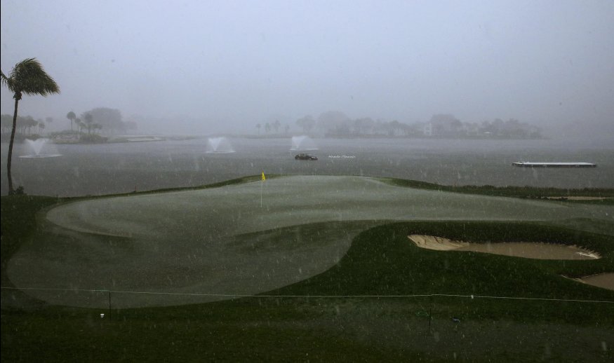 PALM BEACH GARDENS, FL - FEBRUARY 28:  The 18th green is under water as play is suspended for the day due to severe weather during the third round of The Honda Classic at PGA National Resort & Spa - Champion Course on February 28, 2015 in Palm Beach Gardens, Florida.  (Photo by David Cannon/Getty Images)