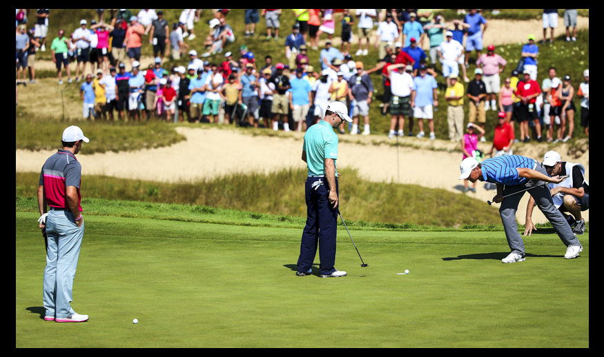 SHEBOYGAN, WI - AUGUST 14: Zach Johnson and Jordan Spieth of the United States look at the golf ball of Johnson near the cup on the first green during the second round of the 2015 PGA Championship at Whistling Straits on August 14, 2015 in Sheboygan, Wisconsin.  (Photo by Andrew Redington/Getty Images)