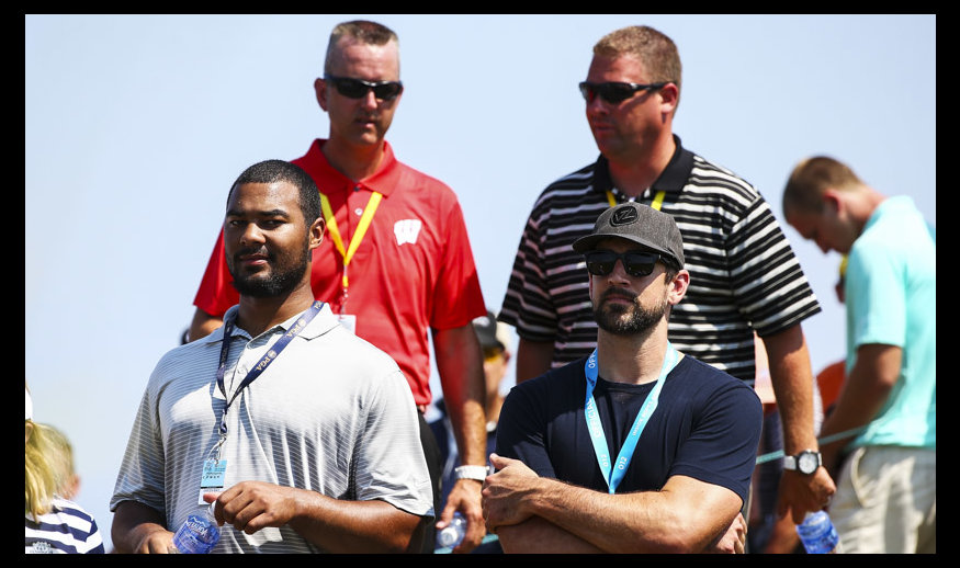 SHEBOYGAN, WI - AUGUST 14: Aaron Rodgers, quarterback of the Green Bay Packers, is seen with other Packers players during the second round of the 2015 PGA Championship at Whistling Straits on August 14, 2015 in Sheboygan, Wisconsin.  (Photo by Tom Pennington/Getty Images)