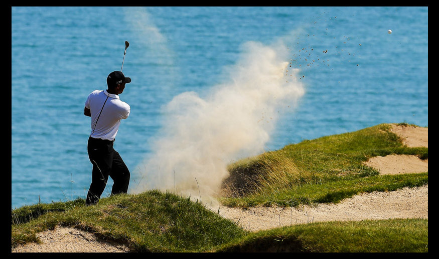SHEBOYGAN, WI - AUGUST 14: Tiger Woods of the United States hits a shot from the sand on the 4th hole during the second round of the 2015 PGA Championship at Whistling Straits on August 14, 2015 in Sheboygan, Wisconsin.  (Photo by Kevin C. Cox/Getty Images)