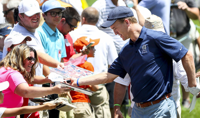DUBLIN, OH - JUNE 01: Former NFL quarterback, Peyton Manning, signs autographs for fans during the pro-am round prior to The Memorial Tournament Presented By Nationwide at Muirfield Village Golf Club on June 1, 2016 in Dublin, Ohio.  (Photo by Sam Greenwood/Getty Images)