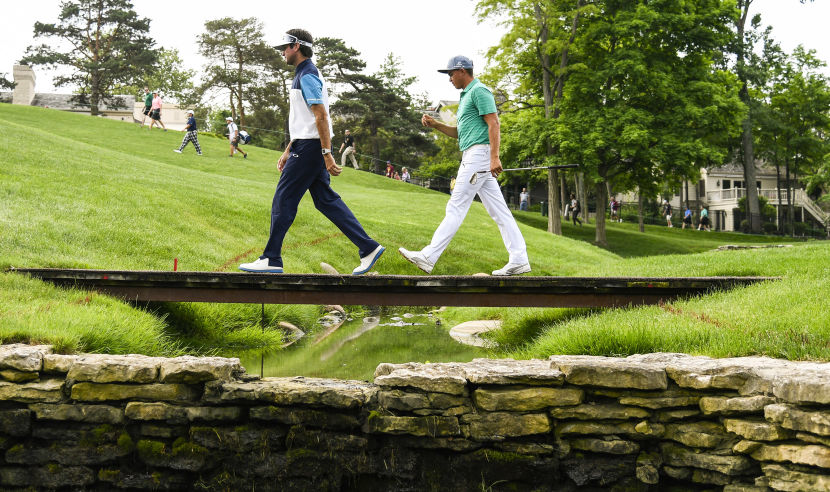 DUBLIN, OHIO - JUNE 02:  Bubba Watson and Rickie Fowler cross a bridge to the 17th hole green during the first round of the Memorial Tournament presented by Nationwide at Muirfield Village Golf Club on June 2, 2016 in Dublin, Ohio. (Photo by Ryan Young/PGA TOUR)