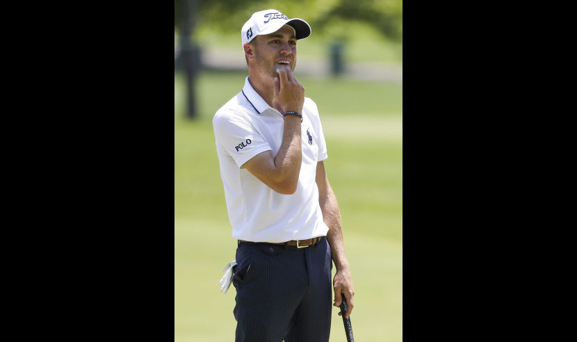 BETHESDA, MD - JUNE 25:  Justin Thomas reacts after missing a putt on the fourth green during the third round of the Quicken Loans National at Congressional Country Club on June 25, 2016 in Bethesda, Maryland. (Photo by Patrick Smith/Getty Images)