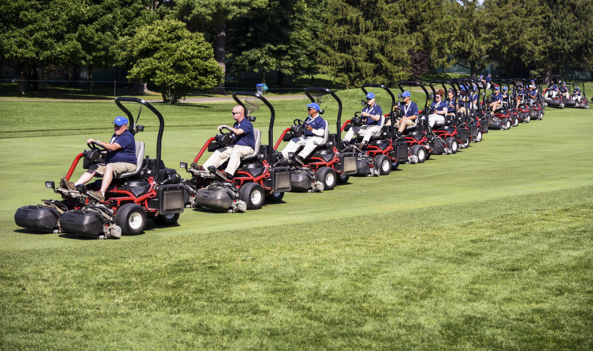 BETHESDA, MD - JUNE 25:  Grounds staff use lawnmowers on the first hole fairway during the third round of the Quicken Loans National at Congressional Country Club (Blue) on June 25, 2016 in Bethesda, Maryland. (Photo by Keyur Khamar/PGA TOUR)