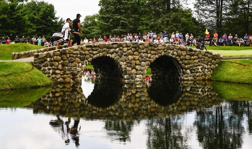 AKRON, OH - JULY 02: Jason Day and his caddy walk across the bridge on the third hole during the third round of the World Golf Championships-Bridgestone Invitational at Firestone Country Club on July 2, 2016 in Akron, Ohio. (Photo by Ryan Young/PGA TOUR)