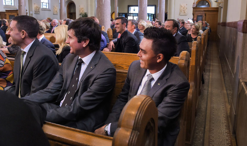 LATROBE, PA - OCTOBER 04: Bubba Watson and Rickie Fowler listen to remarks during the Celebration of the Life and Legacy of Arnold Palmer at the Vincent Basilica, on the campus of Saint Vincent College on October 4, 2016 in Latrobe, Pennsylvania. Palmer, a golf legend who won 62 PGA tour titles over the course of his career, died on September 25, 2016 at age 87. (Photo by Stan Badz/PGA TOUR)