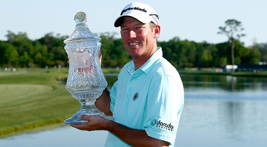 Jim Herman celebrates his victory on the 18th green during the final round of the Shell Houston Open. (Scott Halleran/Getty Images)