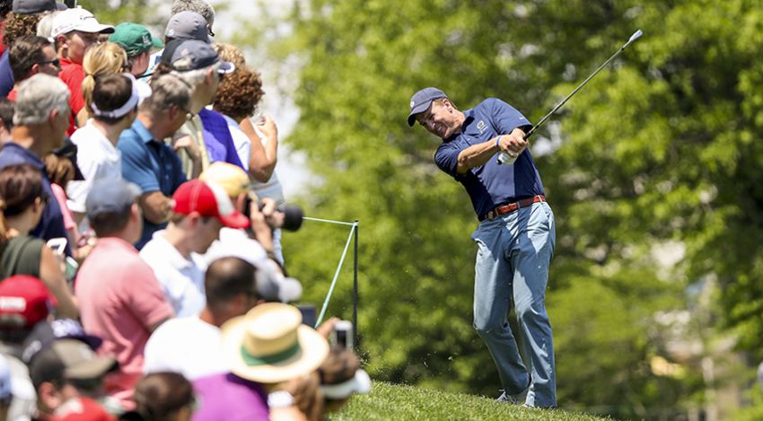 Though he's traded the gridiron in for a set of irons, Peyton Manning still drew quite a crowd in Wednesday's pro-am at Muirfield Village. (Sam Greenwood/Getty Images)