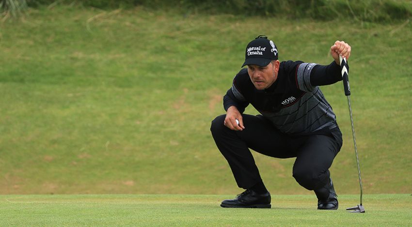 Henrik Stenson drained a 50-foot birdie putt during the final round of The Open Championship to help him secure the Claret Jug. (Mike Ehrmann/Getty Images)