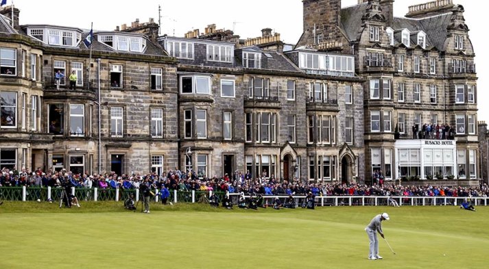 Dustin Johnson started off the year's third major with an eagle and five birdies on the Old Course at St. Andrews to take the clubhouse lead by one stroke. (Streeter Lecka/Getty Images)