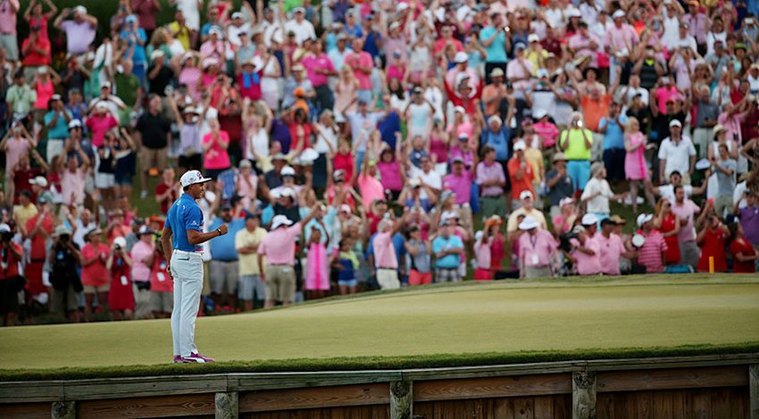 Rickie Fowler reacts after holing the winning putt on the 17th green to claim THE PLAYERS in a dramatic playoff. (Mike Ehrmann/Getty Images)
