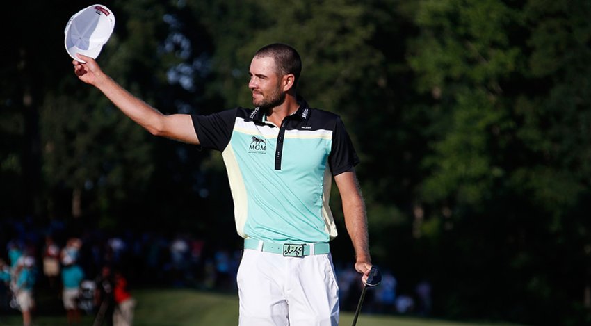 Troy Merritt reacts after making birdie on the 72nd hole en route to winning his first career title. (Rob Carr/Getty Images)