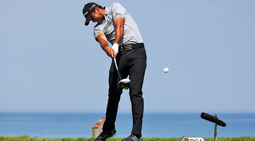 Jason Day (above) and Matt Jones both sit at 9 under. Day is through 14 holes and Jones is through 12. (Tom Pennington/Getty Images)